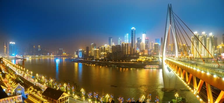 Chongqing's skyline and river confluence lit up at night