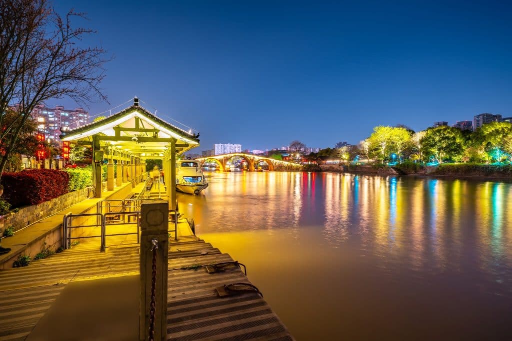 Gongchen Bridge arching over the Grand Canal in Hangzhou at dusk