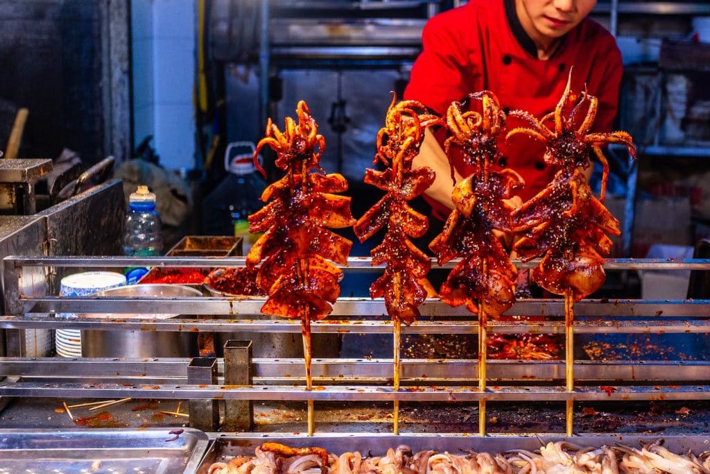 Grilled squid skewers at a night food stall in Xi'an