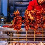 Grilled squid skewers at a night food stall in Xi'an