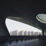 Curved white canopy roof with an oval skylight at the entrance of Hangzhou East Railway Station, the departure station for high-speed trains to Shanghai.