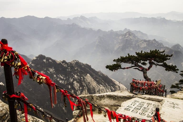 Wish locks tied to the railings at the summit of Huashan, a day trip from Xi'an.