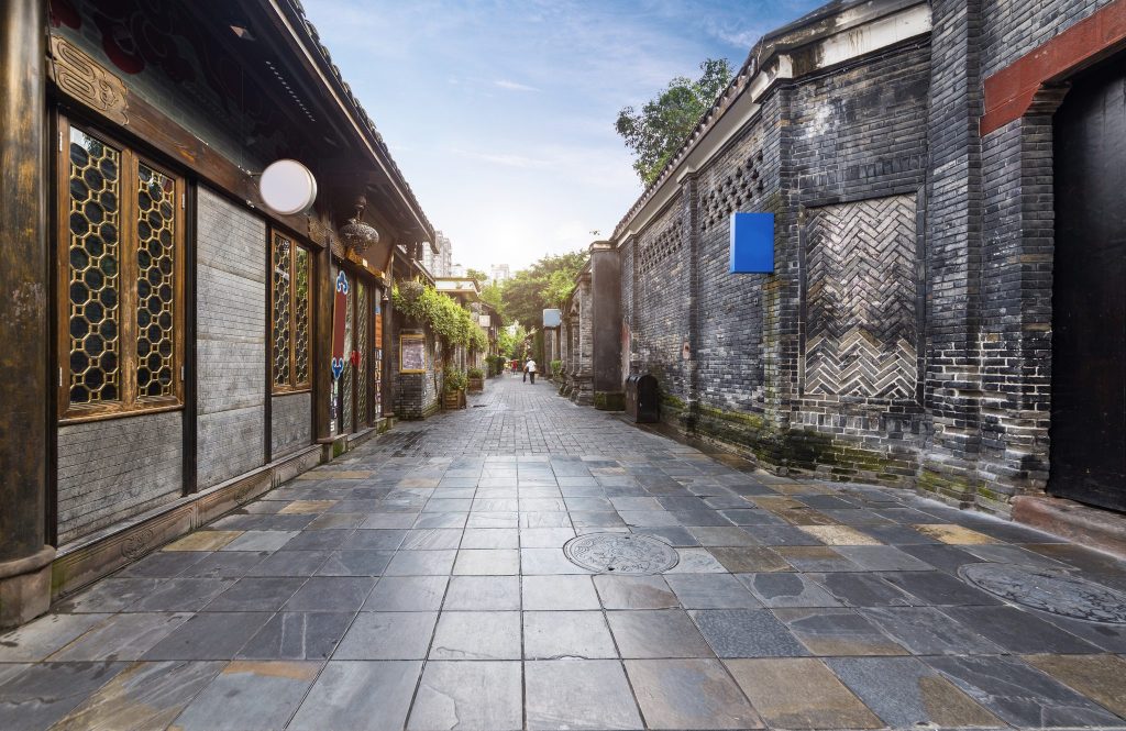 Empty grey-brick lane in the Kuanzhai Alley quarter of Chengdu at dawn