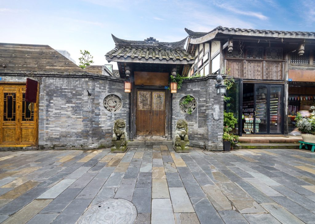Stone and timber courtyard gateway on Kuan Alley in the Kuanzhai Alley quarter of Chengdu, Sichuan