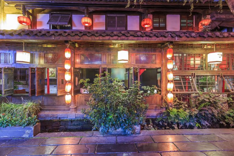 Red lanterns and timber facades in the old town quarter of Chengdu at night