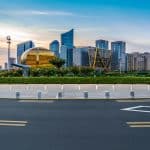 Qianjiang New Town skyline at dusk in Hangzhou, with the golden globe of the Hangzhou International Conference Center