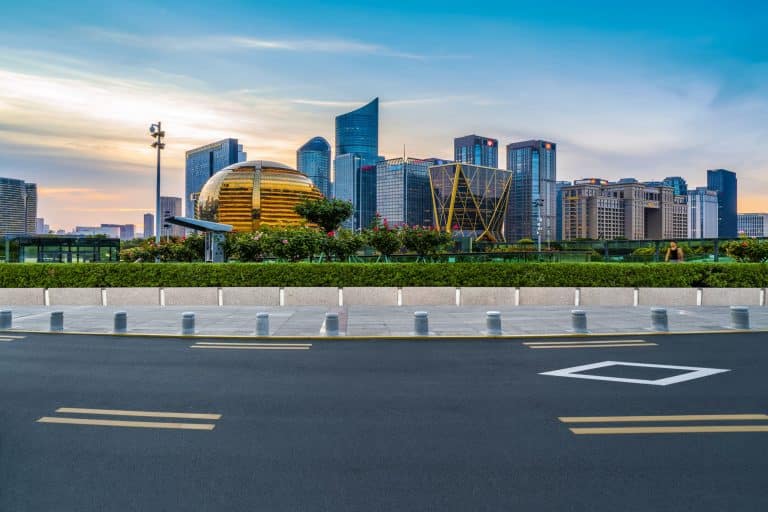 Qianjiang New Town skyline at dusk in Hangzhou, with the golden globe of the Hangzhou International Conference Center