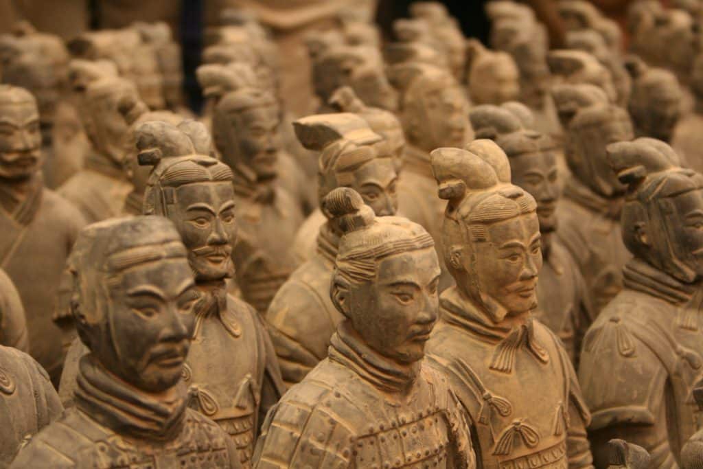 Rows of life-size terracotta warriors in the Terracotta Army pits, Xi'an