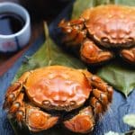 Steamed Yangcheng Lake hairy crabs served with black vinegar dipping sauce, a Suzhou-area specialty