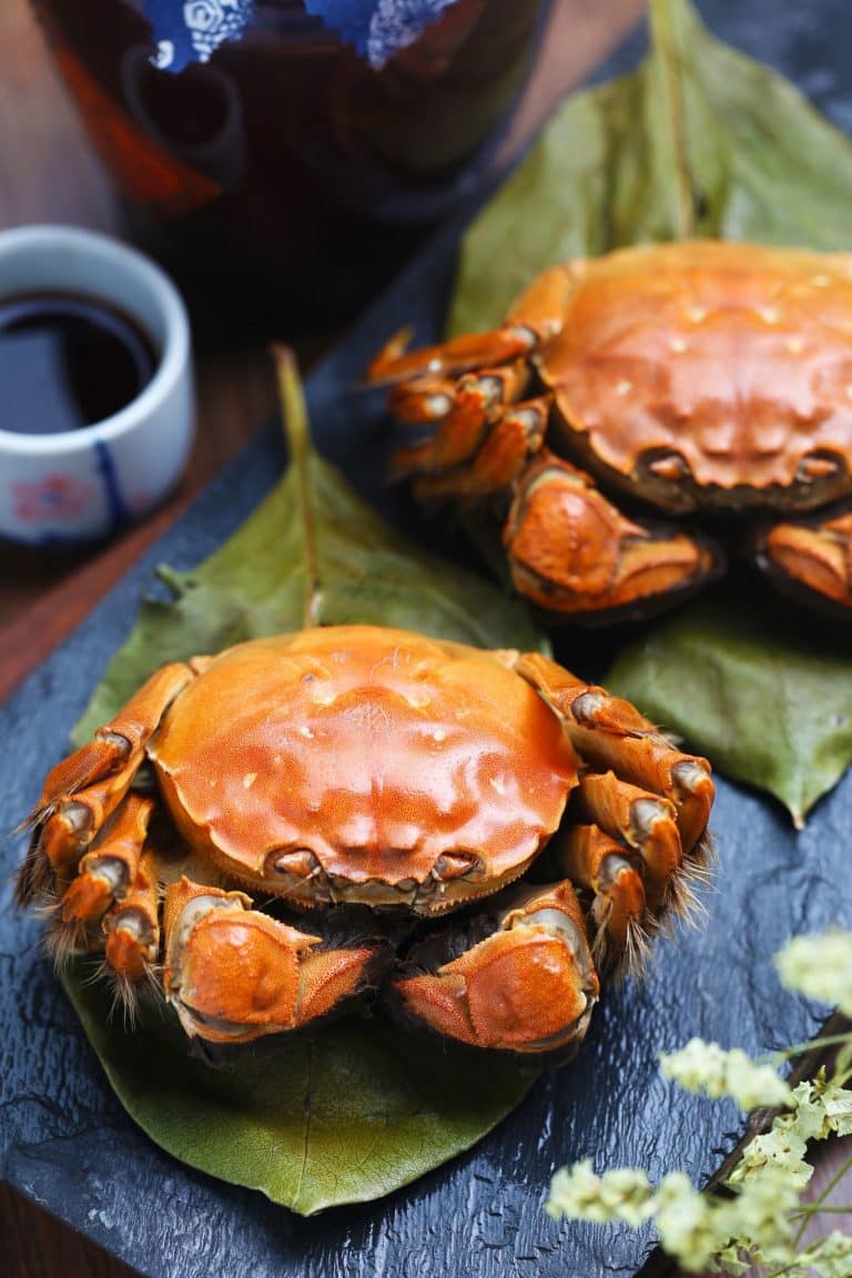 Steamed Yangcheng Lake hairy crabs served with black vinegar dipping sauce, a Suzhou-area specialty