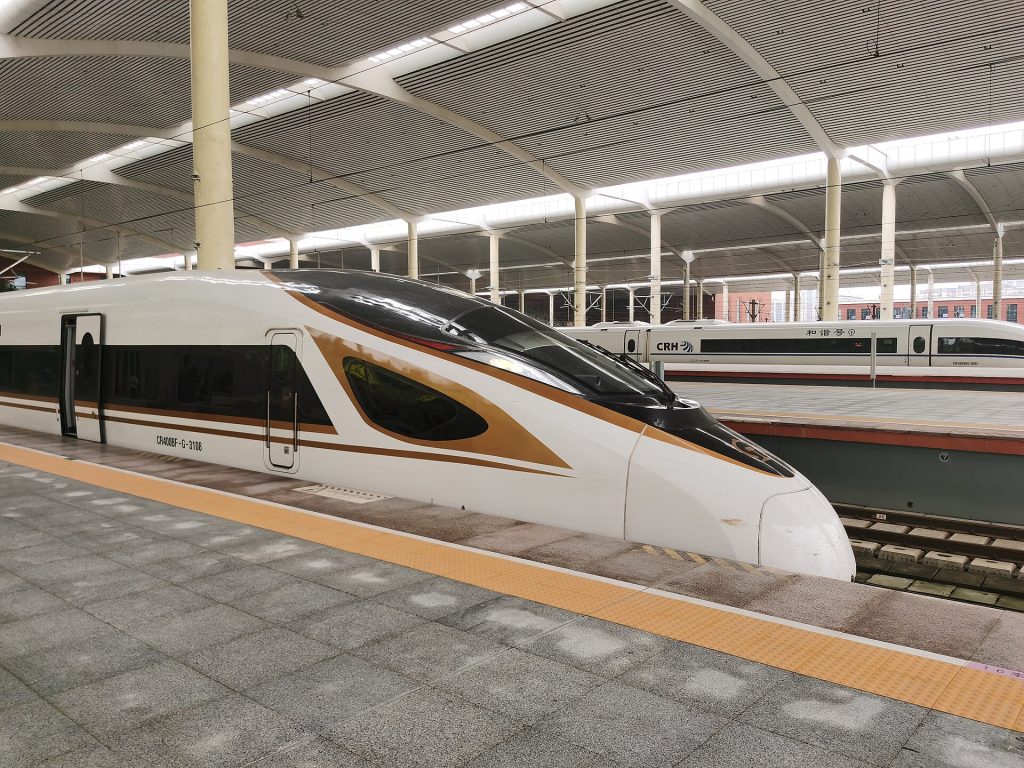 Fuxing CR400BF-G high-speed train at a platform of Harbin West Railway Station