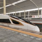 Fuxing CR400BF-G high-speed train at a platform of Harbin West Railway Station