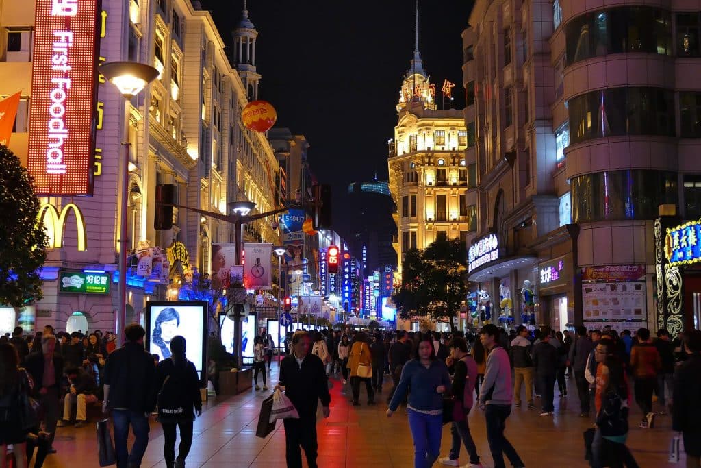 Crowds and neon signs on the Nanjing Road pedestrian street at night, Shanghai