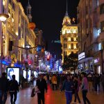Crowds and neon signs on the Nanjing Road pedestrian street at night, Shanghai