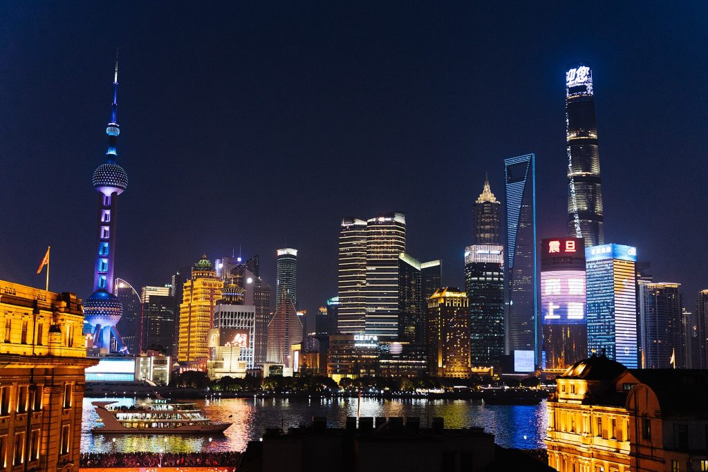 Pudong skyline lit up at night, seen across the Huangpu River from the Bund, Shanghai