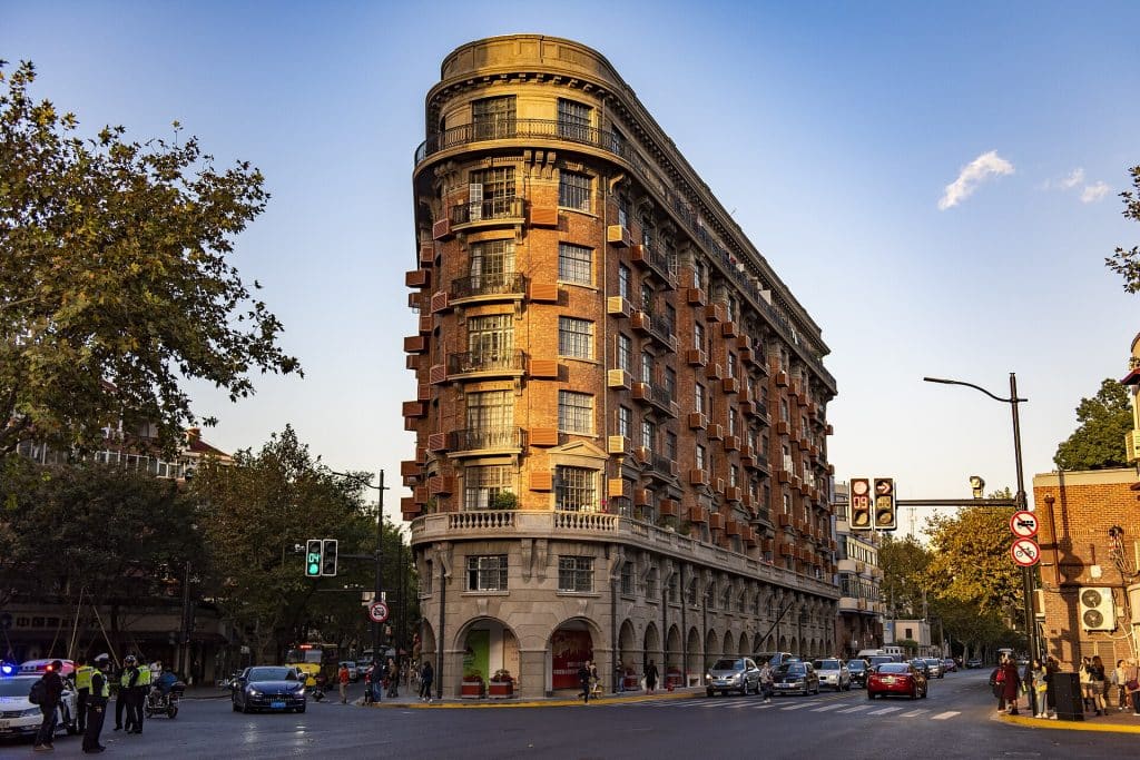 Wukang Mansion, the 1924 apartment building at the end of Wukang Road, under a blue November sky, Shanghai