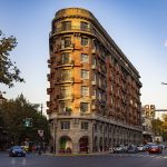 Wukang Mansion, the 1924 apartment building at the end of Wukang Road, under a blue November sky, Shanghai
